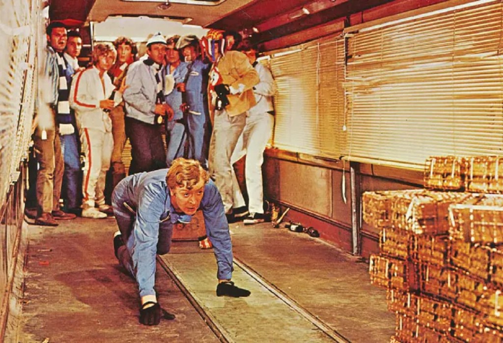 Michael Caine tries to retrieve the gold at the end of The Italian Job (1969).