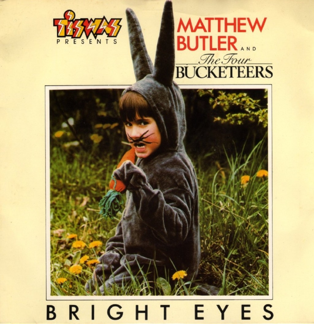 Matthew Butler And The Four Bucketeers - Bright Eyes/We Are The Four Bucketeers (CBS, 1981)